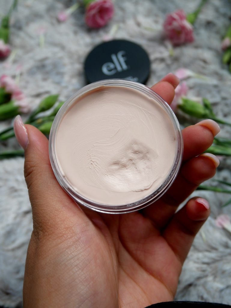 Demonstrating application of e.l.f. Poreless Putty Primer